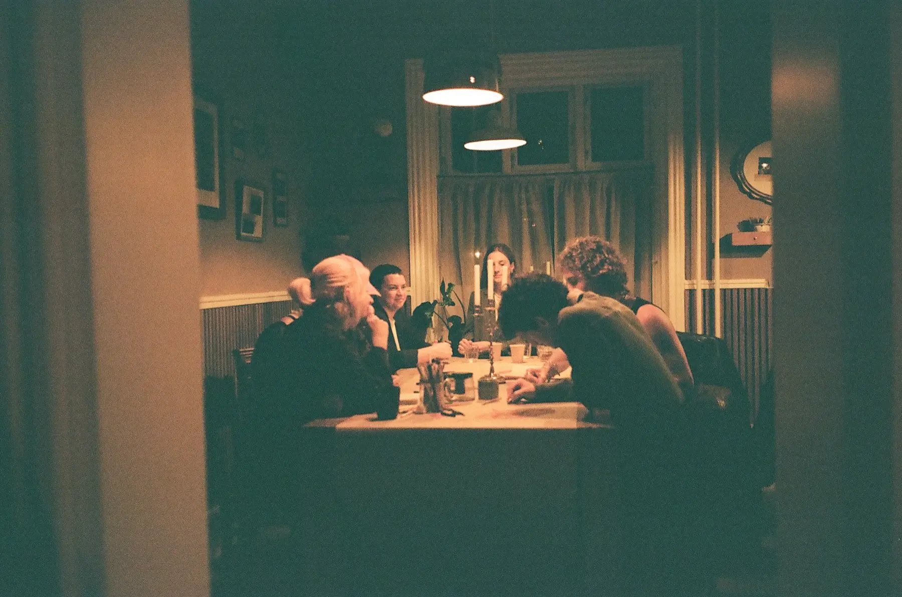 A long table set for dinner in the house